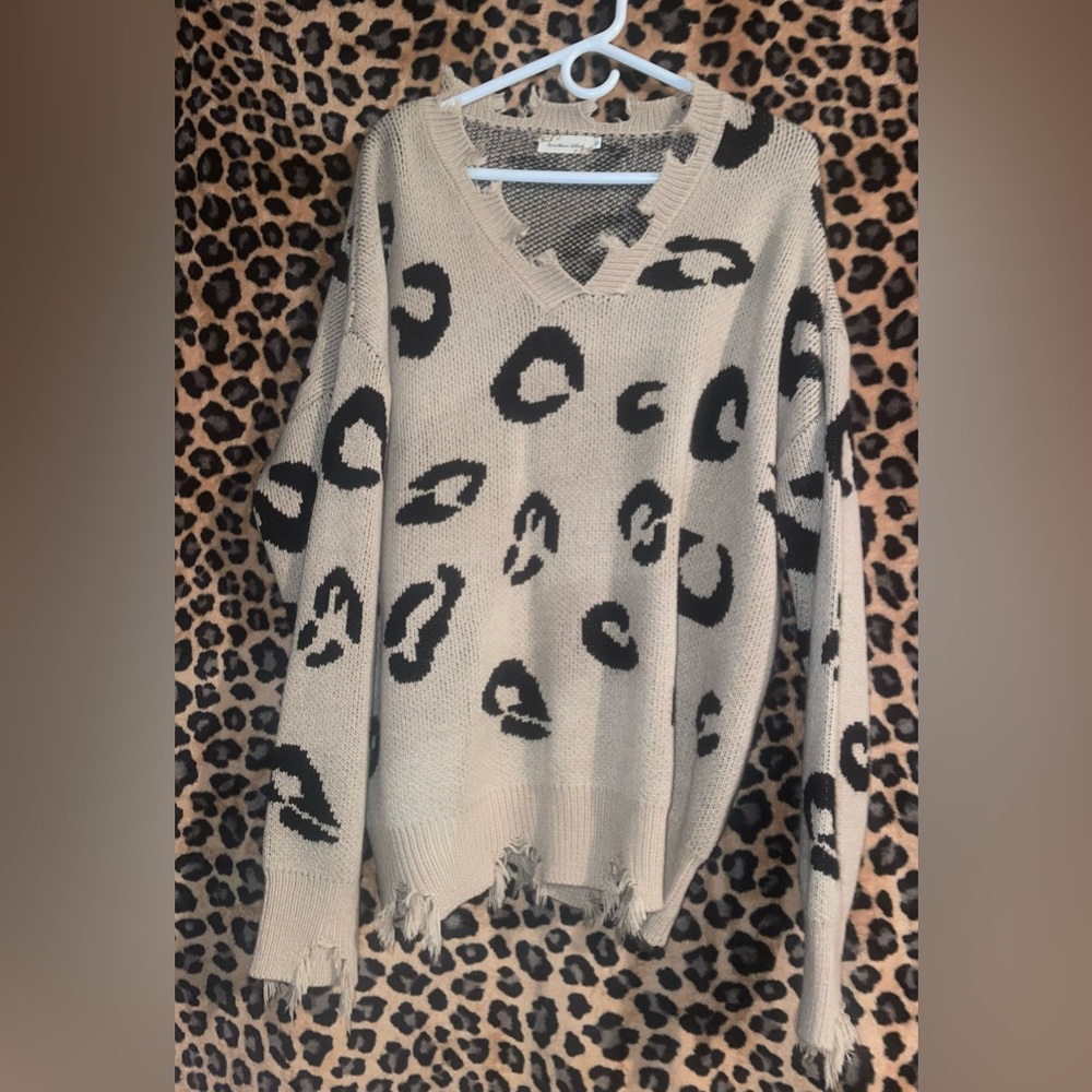 Tan leopard print sweater. Oversized. Small but fits like a large.